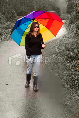 The original photo of the woman with the cane is modified so her surroundings are in black and white. This includes the cane, which is blurred and pixelated until it matches the gray of her surroundings