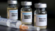 Reuters photo covid19 vaccine bottles and syringe